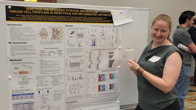 Karen Cyndari with poster